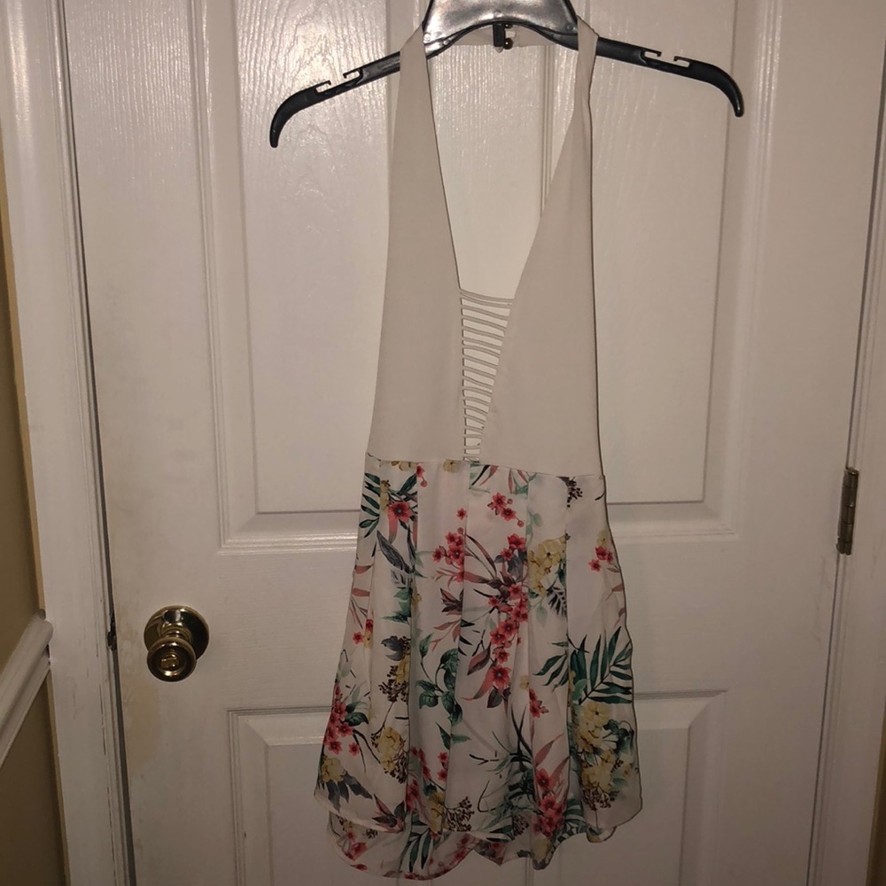 Open back romper with a halter neck